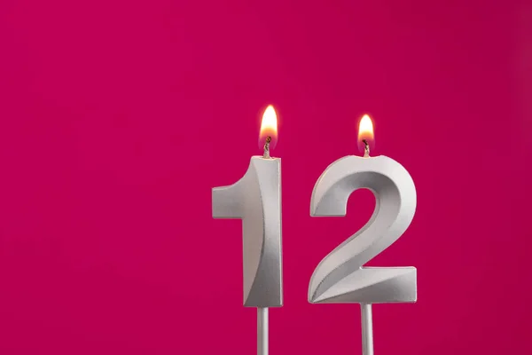 Kerze Geburtstag Auf Rhodaminrotem Hintergrund — Stockfoto