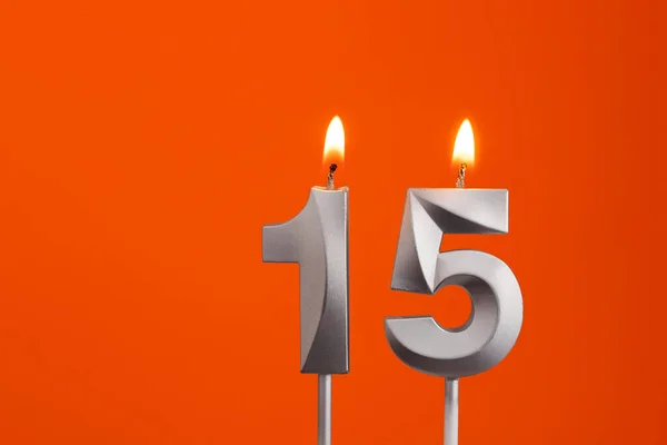 Nummer Silberner Jahrestag Kerze Auf Orangefarbenem Hintergrund — Stockfoto