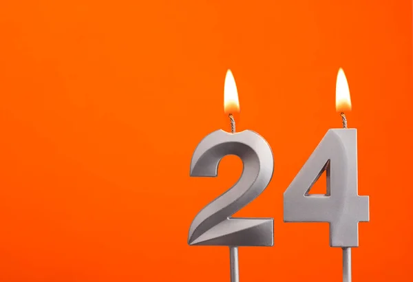Kerze Geburtstag Auf Orangefarbenem Hintergrund — Stockfoto