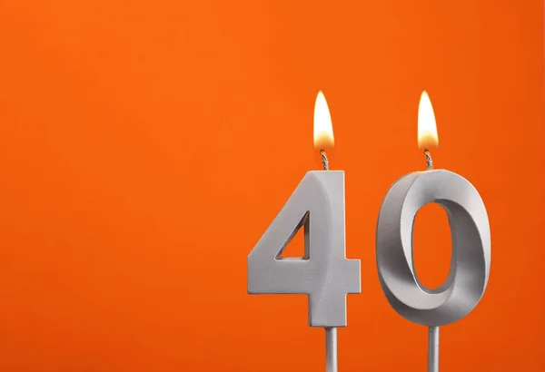Candle number 40 - Birthday in orange background