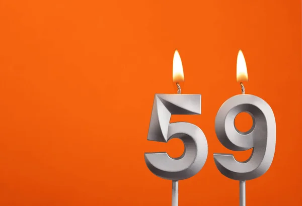 Nummer Silver Anniversary Candle Auf Orangefarbenem Hintergrund — Stockfoto