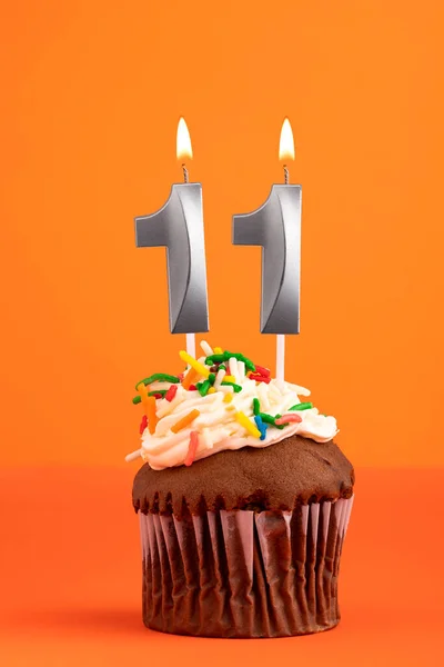 Świeca Numer Urodziny Ciasta Pomarańczowym Tle — Zdjęcie stockowe