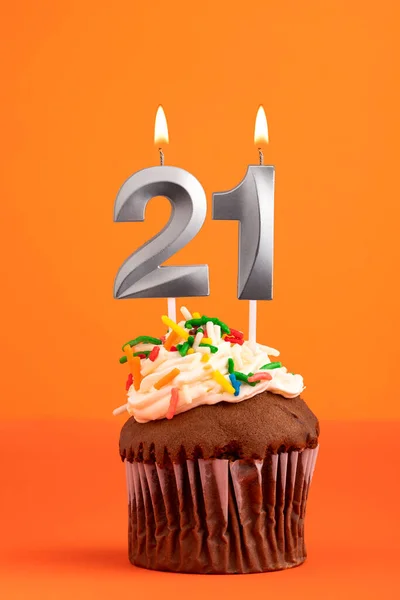 stock image Candle number 21 - Cake birthday in orange background