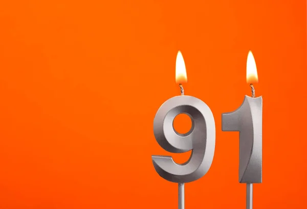 91号 橙色背景银婚蜡烛 — 图库照片
