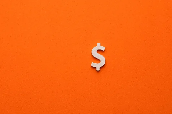 橙色背景上的美元符号 网站设计或标识的符号 — 图库照片