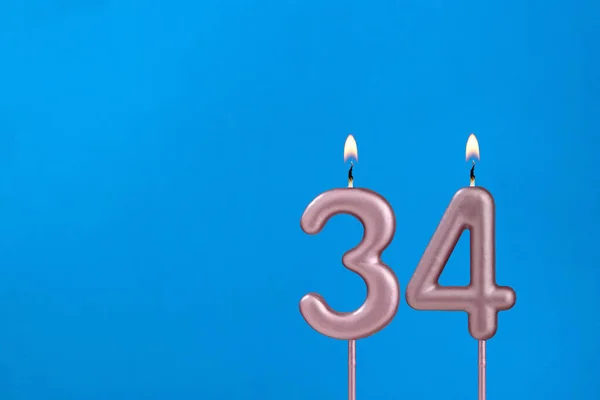 Número Vela Aniversario Ardiente Sobre Fondo Azul Espumoso — Foto de Stock