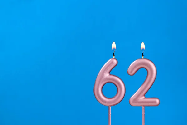 Świeca Numer Urodziny Niebieskim Piankowym Tle — Zdjęcie stockowe