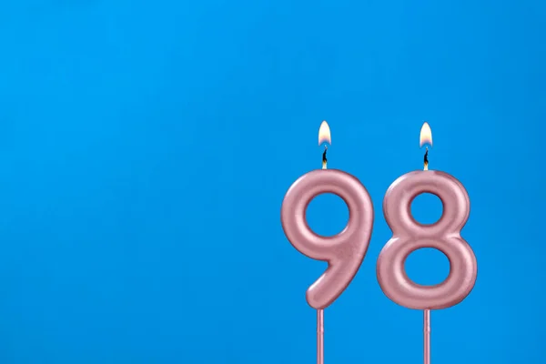 Candle number 98 - Birthday in blues foamy background