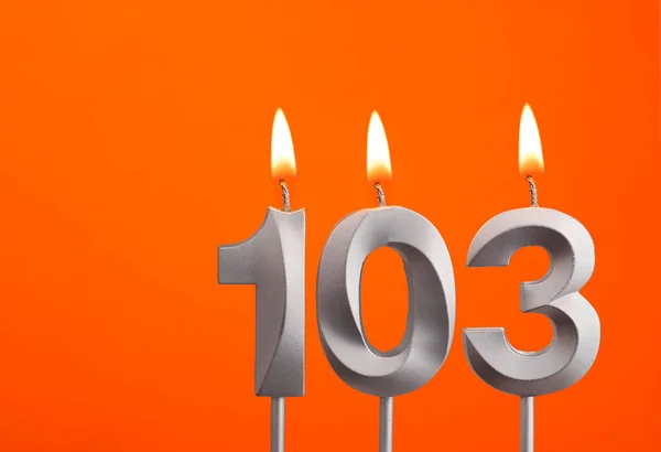 Vela 103 Vela Aniversario Plata Sobre Fondo Naranja —  Fotos de Stock