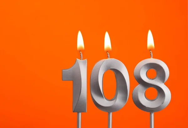 Svíčka Číslo 108 Narozeniny Oranžovém Pozadí — Stock fotografie