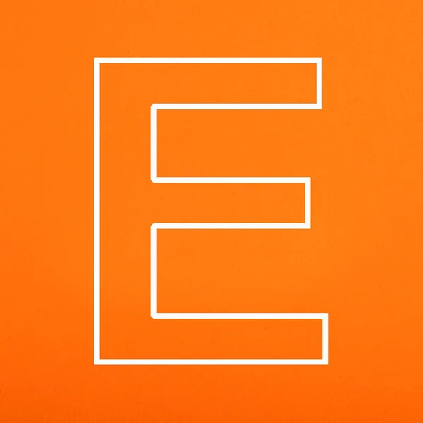 Buchstabe Großbuchstabe Weißer Farbe Isoliert Auf Orange Schaumigen Hintergrund Geschrieben — Stockfoto