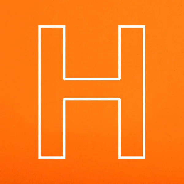 ホワイト手紙H大文字上のオレンジFamy背景 — ストック写真