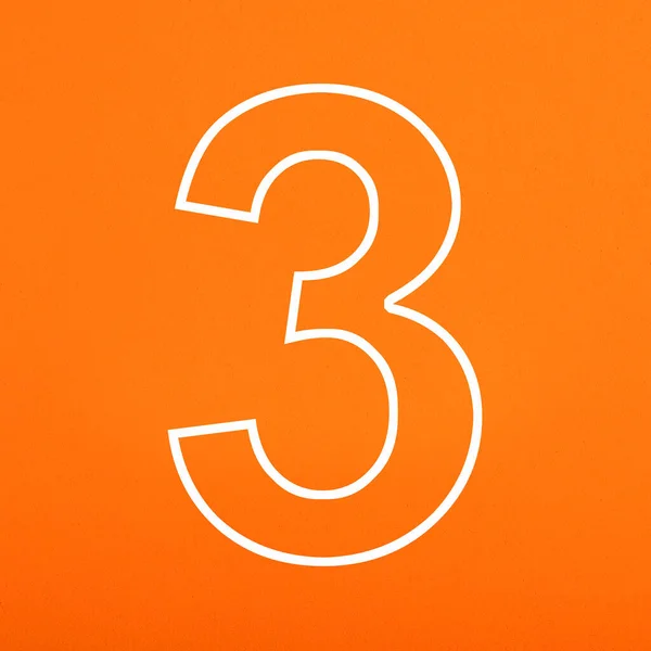 Numer Napisany Pomarańczowym Piankowym Tle — Zdjęcie stockowe