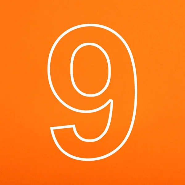 Číslo Napsáno Bíle Oranžovém Pěnovém Pozadí — Stock fotografie