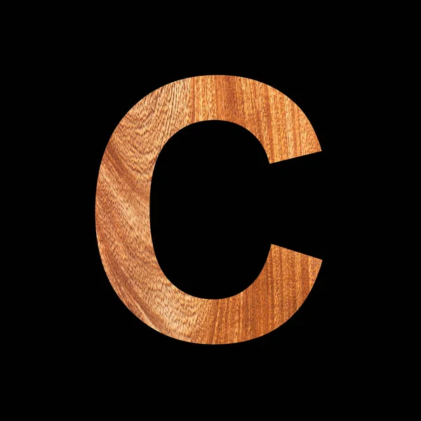 橡木背景的大写字母C 黑色背景 — 图库照片