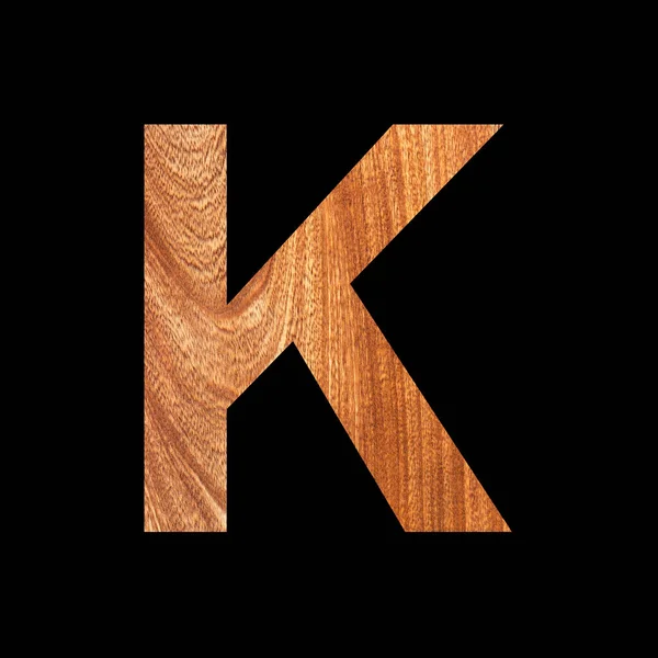 橡木背景的大写字母K 黑色背景 — 图库照片