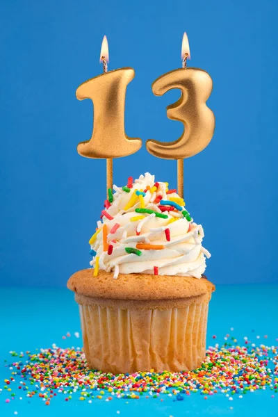 stock image Candle number 13 - Cake birthday in blue background