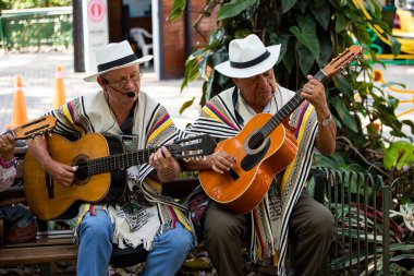 Medellin, Antioquia. Colombia - January 26, 2023. Antioquian street artists performing traditional Colombian music