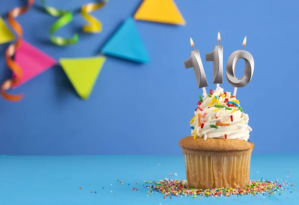stock image Candle number 110 - Cake birthday in blue background
