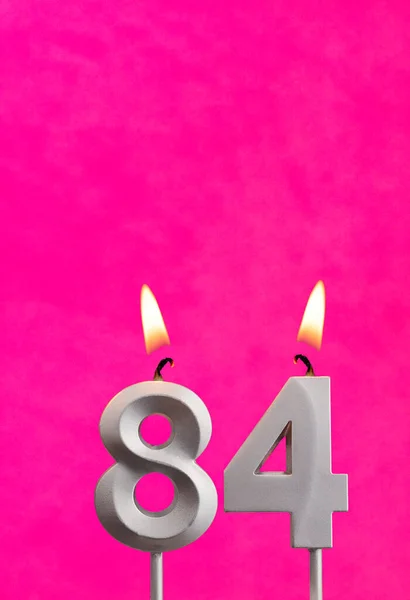 Candle Med Låga Födelsedagskort Fuchsia Bakgrund — Stockfoto