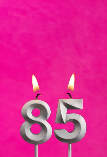 キャンドルナンバー85 フクシアを背景に誕生日のお祝い — ストック写真