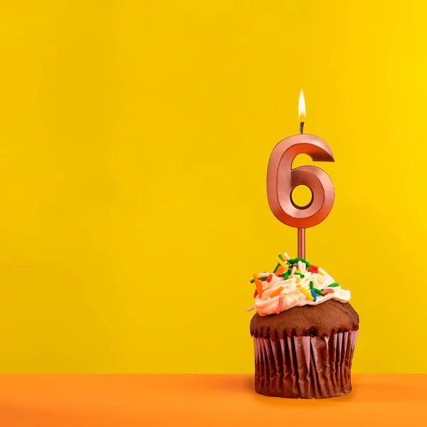 stock image Number 6 birthday candle - Celebration on yellow background