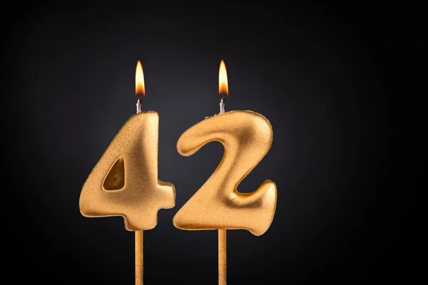 stock image Birthday candle number 42 - Birthday celebration on black background