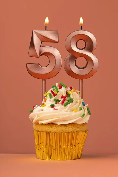 stock image Candle number 58 - Cake birthday in coral fusion background