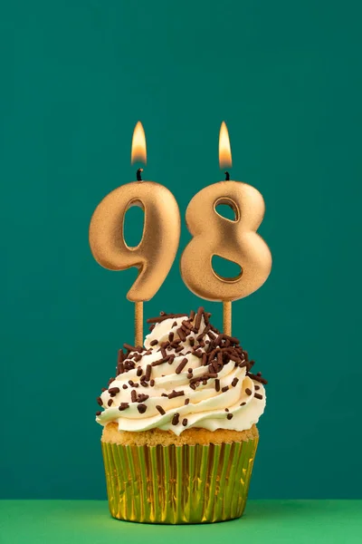 stock image Birthday card with candle number 98 - Green background