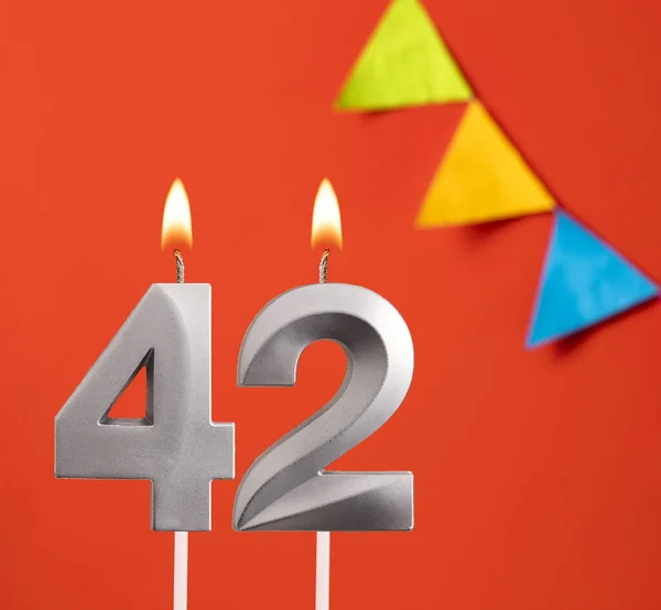 Birthday card - Number 42 candle in orange background