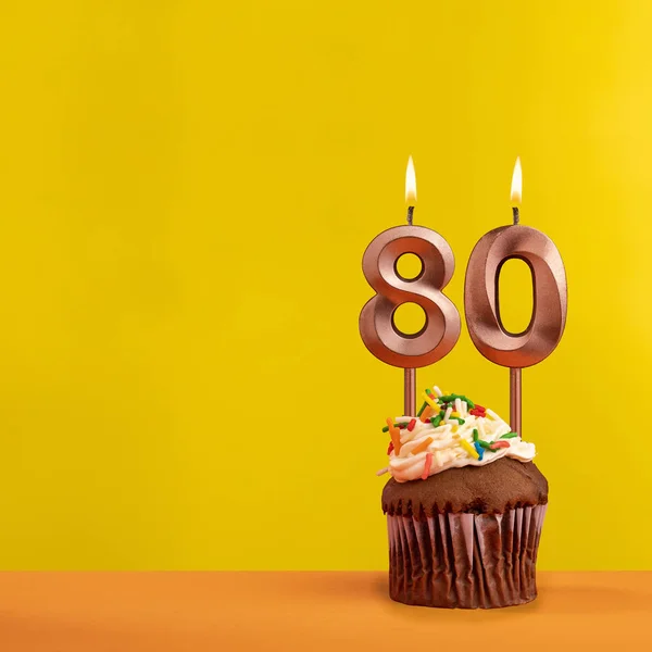 stock image Number 80 birthday candle - Celebration on yellow background