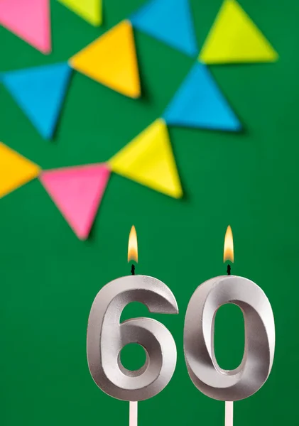 stock image Vertical birthday card with number 60 candle - Green background with pennants