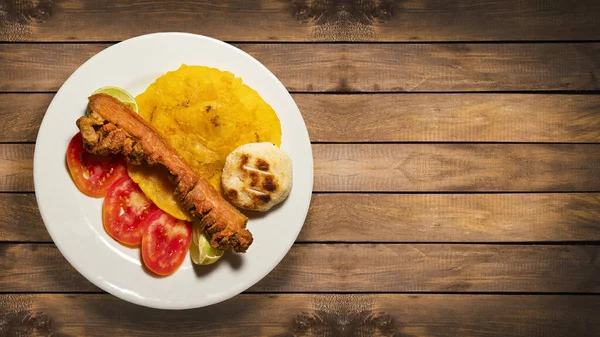 Pork Chicharron Patacones Sliced Tomatoes Colombian Traditional Food — Stock Photo, Image