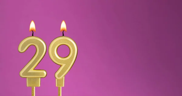 Candle number 29 in purple background - birthday card