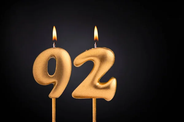 92号生日蜡烛 黑色背景的生日庆祝活动 — 图库照片