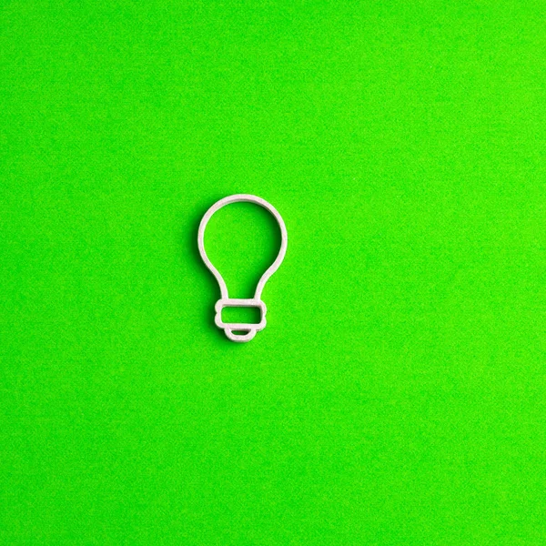 Creativity and innovation concept, graphic resource for design - Light bulb on green color background