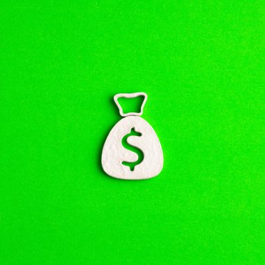 Yeşil renkli arka planda para çantası - Dolar iş konsepti