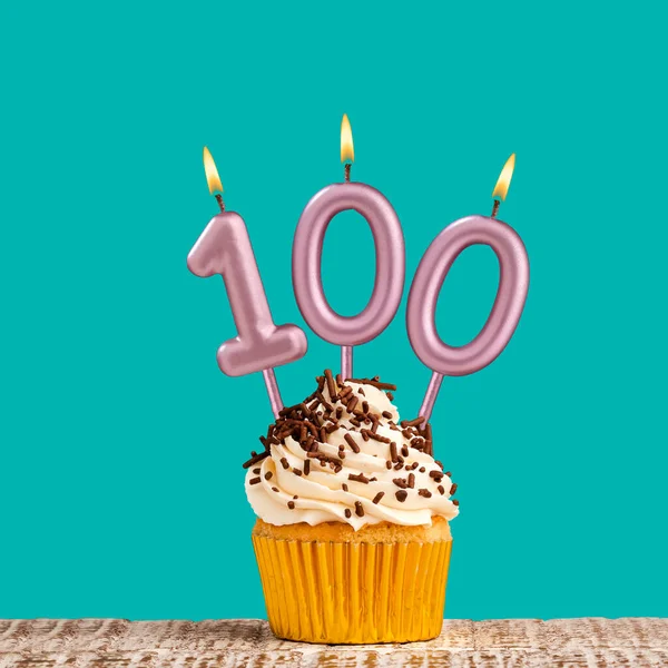 Birthday card with number 100 candle on aquamarine background