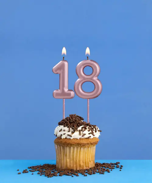 stock image Candle number 18 - Birthday card with cupcake on blue background