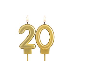 Beyaz arkaplanda 20 numaralı doğum günü mumu