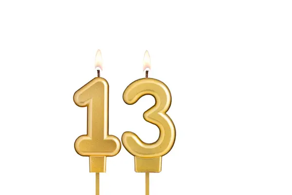 stock image Golden number 13 birthday candle on white background