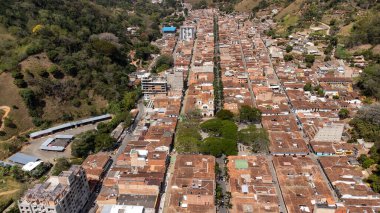 Ciudad Bolivar, Antioquia - Colombia. February 21, 2024. Aerial drone view of the municipality, with a population of 23,361 inhabitants clipart