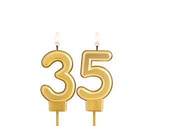 Beyaz arkaplanda 35 numaralı doğum günü mumu