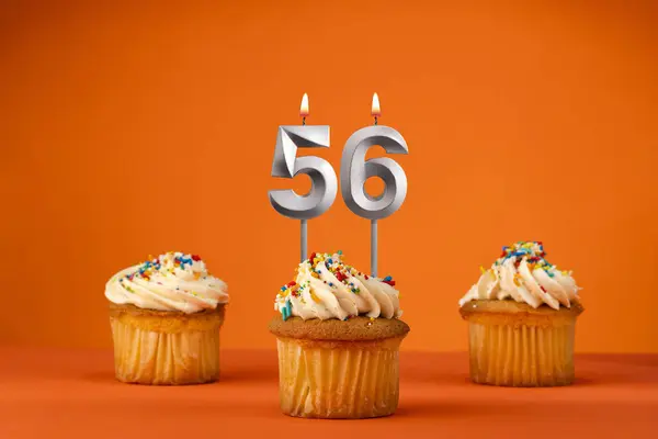 stock image Birthday celebration in orange color - Candle number 56