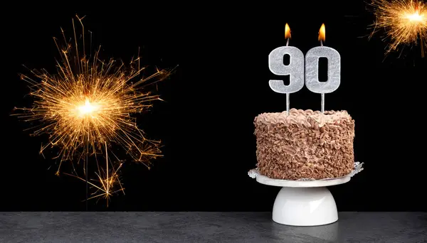 stock image Birthday celebration with cake and candle number 90