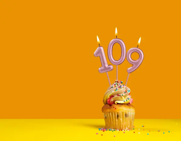 Stock image Birthday celebration with cupcake - Candle number 109