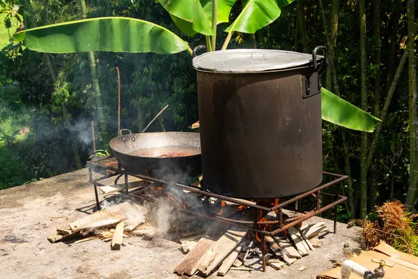 stock image Pot with soot on a wood stove - Typical Colombian tradition