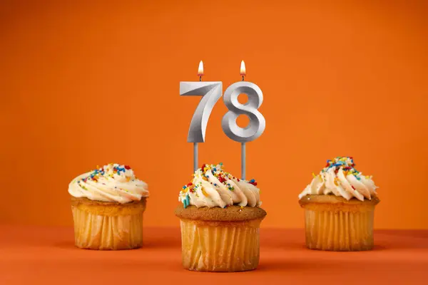 stock image Birthday celebration in orange color - Candle number 78