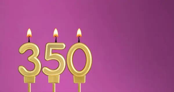 stock image Candle number 350 in purple background - birthday card