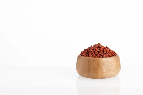 stock image Annatto seeds in the bowl - Seasoning and red food coloring. Bixa Orellana